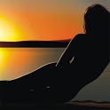 Woman's Silhouette in Sunset icon