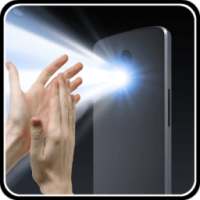 تشغيل الفلاش بالتصفيق أو تصفير