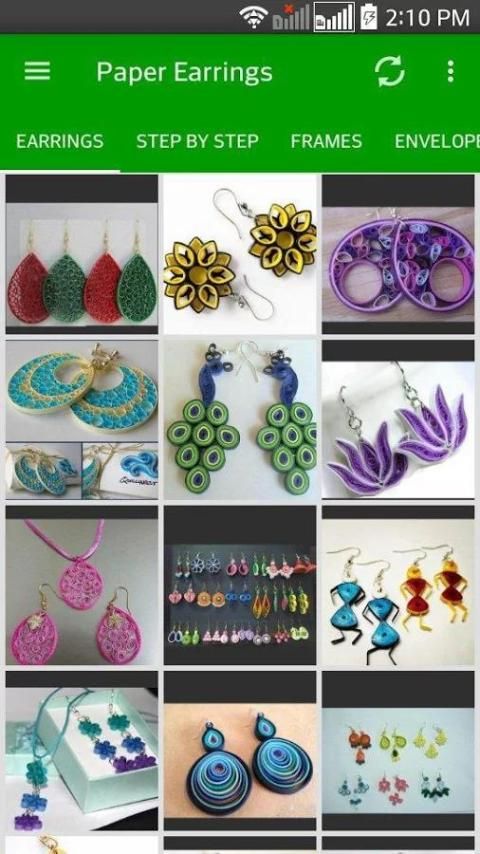 Paper Craft. DIY Quilling Earrings Step 9 Stock Photo - Alamy