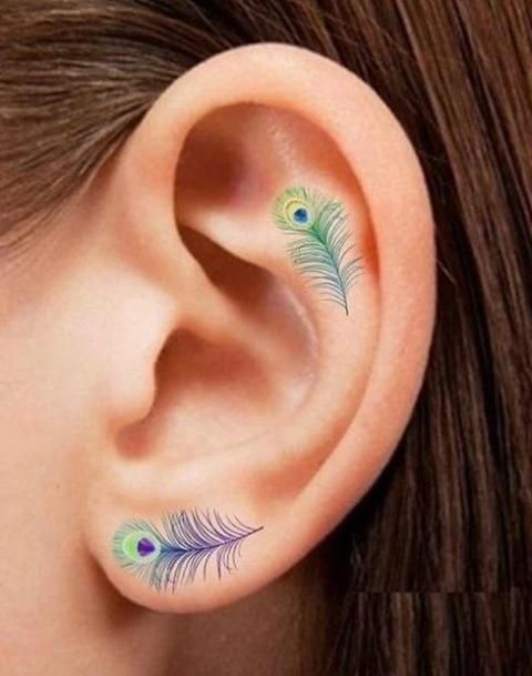 K feather tattoo|| | Hand tattoos for girls, Tattoos, Peacock feather tattoo